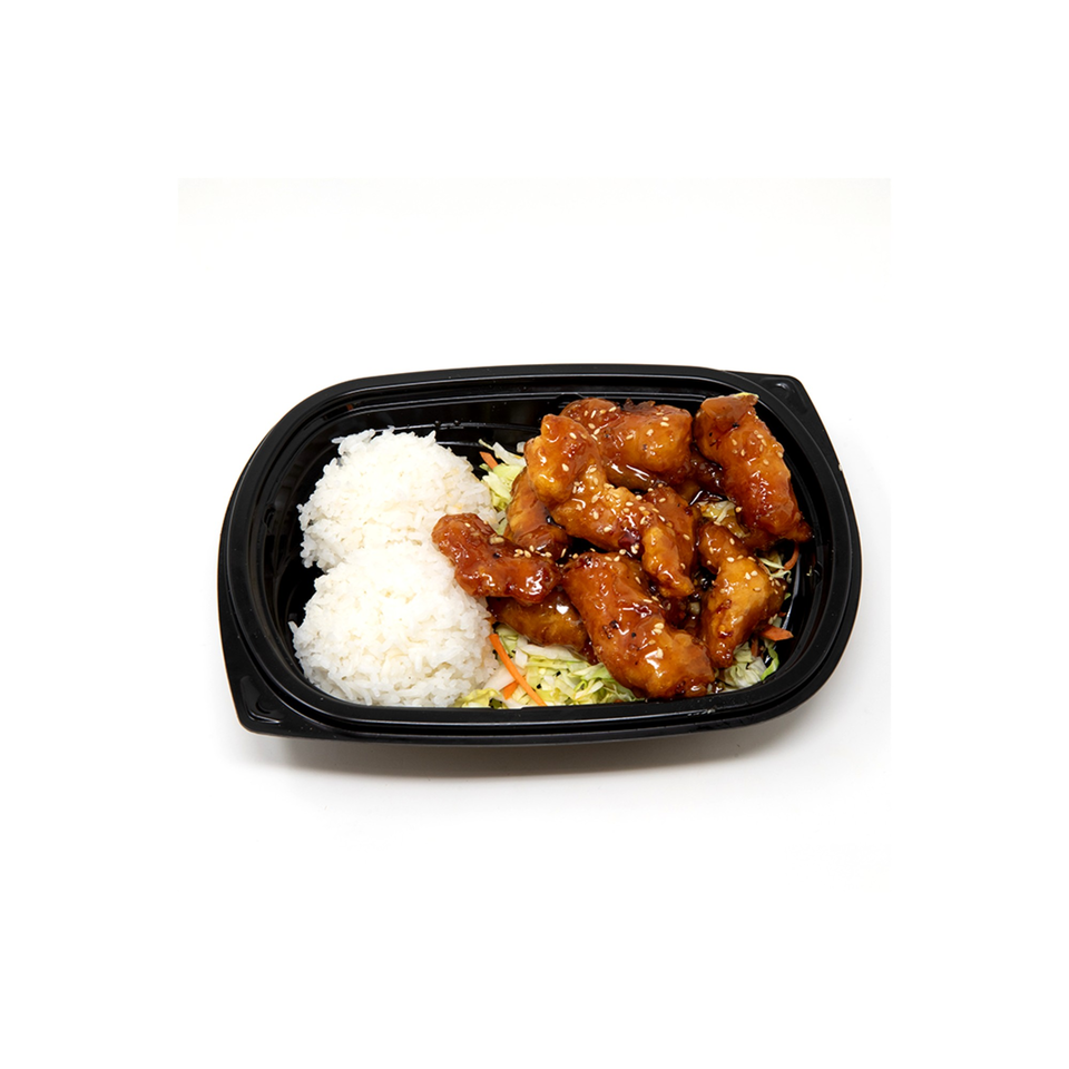 Imperial Chinese's orange chicken with white rice and shredded cabbage in a black takeout container.