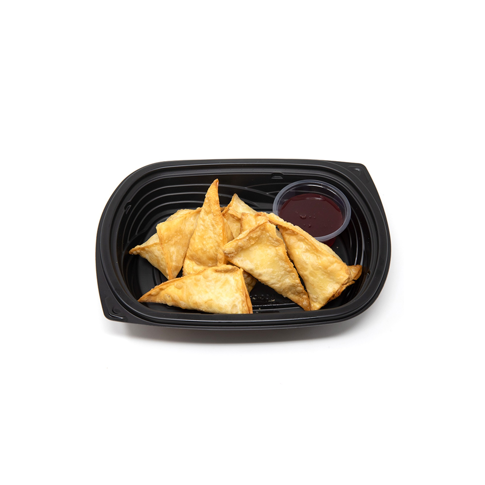 Imperial Chinese crab rangoon with a side of sweet and sour sauce in a black to-go container.