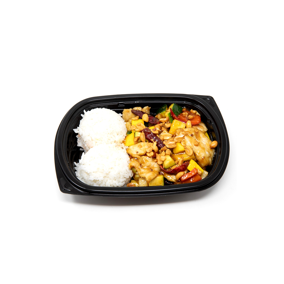 Imperial Chinese Kung Pao Chicken with rice, mango, zucchini, and cashews in a black takeout container.
