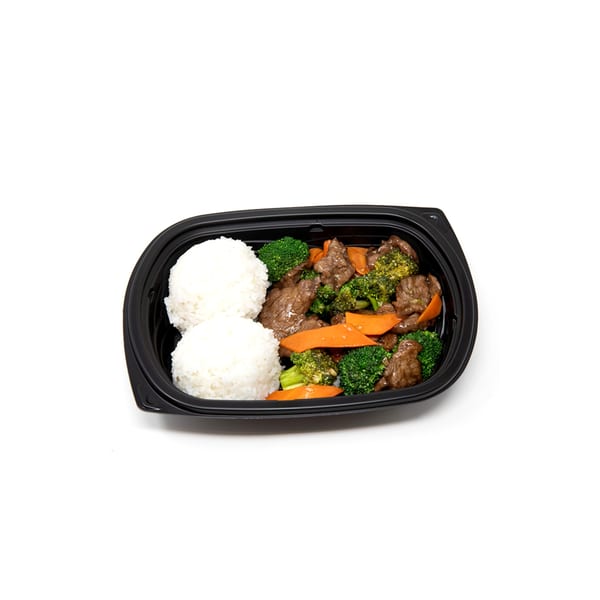 Imperial Chinese beef and broccoli with carrots and white rice in a black takeout container.