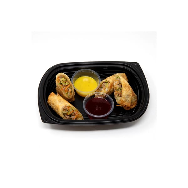 Four Imperial Chinese egg rolls with two dipping sauces in a black takeout container.
